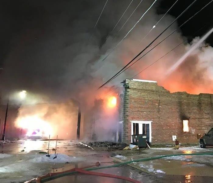 commercial brick building on fire